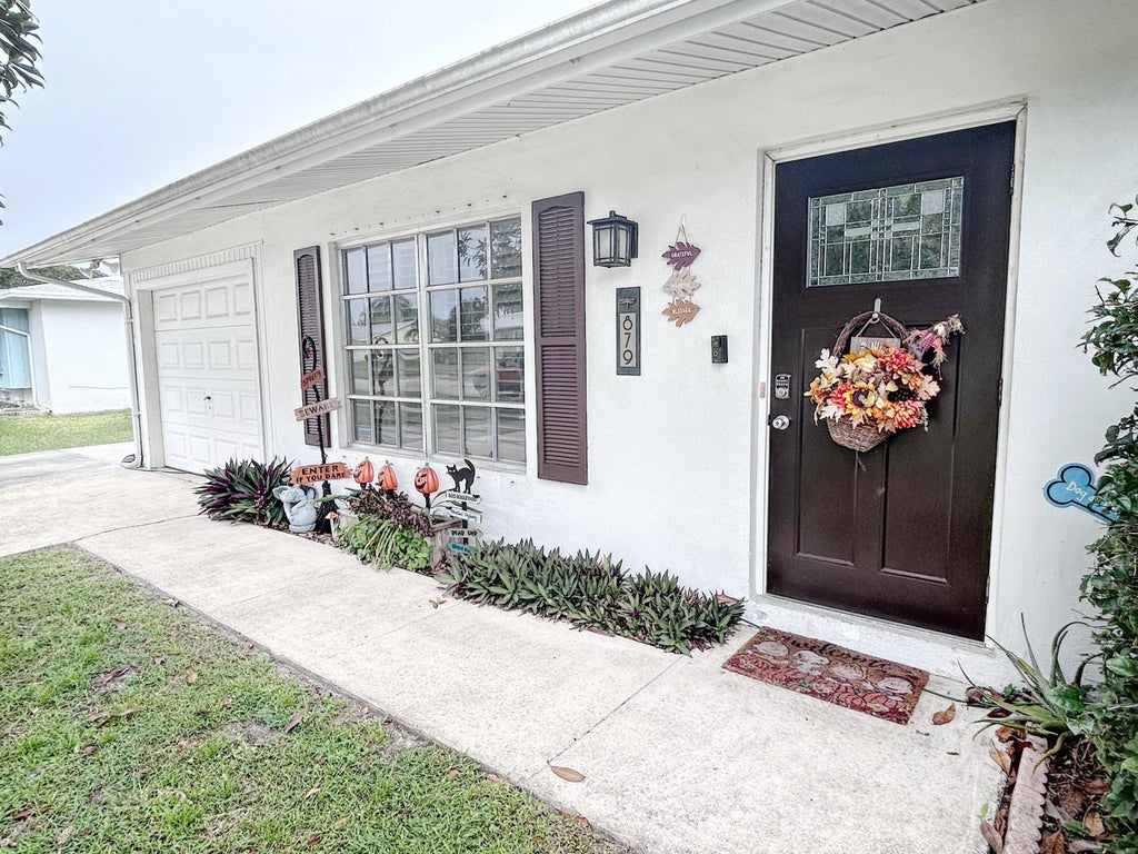 Photo of 879 SW Goodrich Street, Port Saint Lucie, FL 34983 (MLS # R11031226)