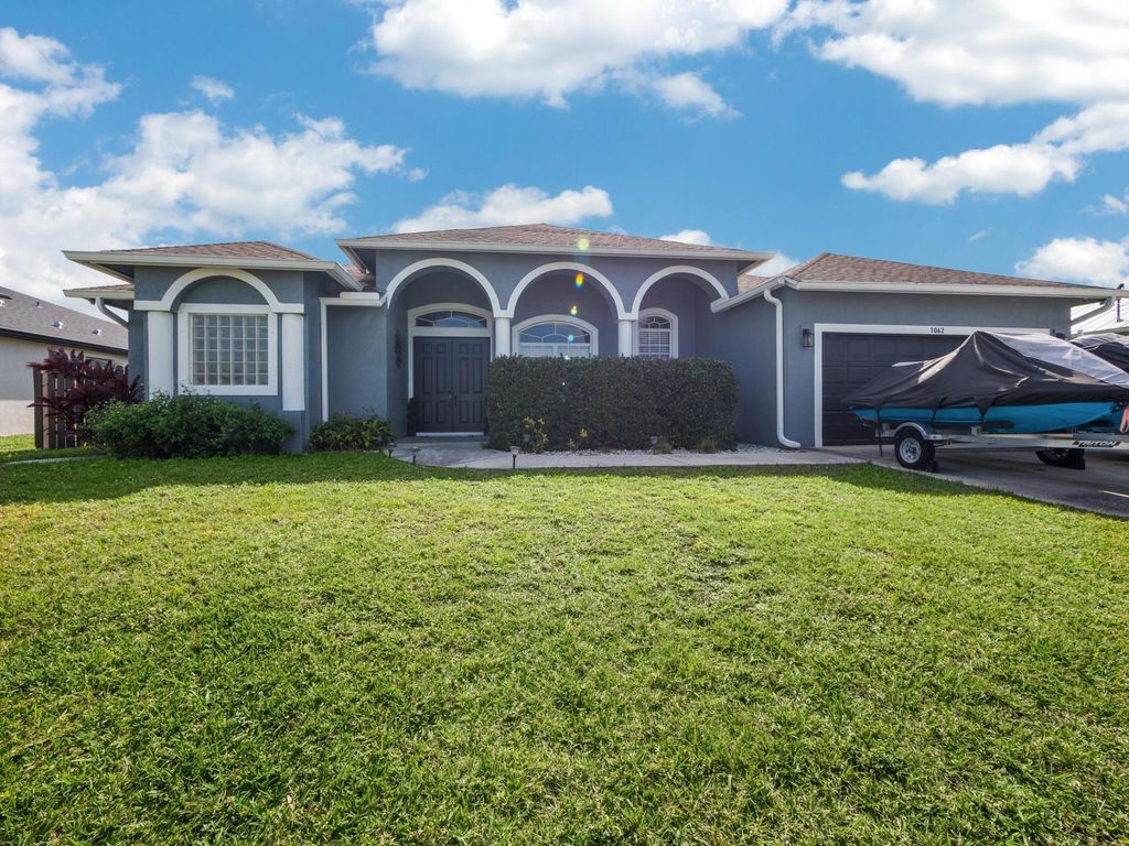 Photo of 1062 SW Abbot Avenue, Port Saint Lucie, FL 34953 (MLS # R11168059)