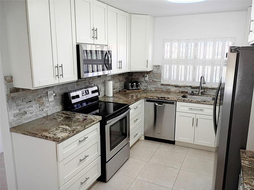 Price drop! Great opportunity in beautiful Sunrise Lakes. 2/2 Condo fully upgraded kitchen and floors with new stainless steel appliances. Freshly painted and ready to move in. Gorgeous golf course view with a babbling brooke. Clubhouse, pool, water, cable and wifi included in HOA. Close to 175, Sawgrass, Sawgrass Mills Mall, Sunrise senior center. Lowest price in the building. Don't miss this one. Seller is motivated. Bring Offers. Vacant and ready to show. No rentals allowed in this building.