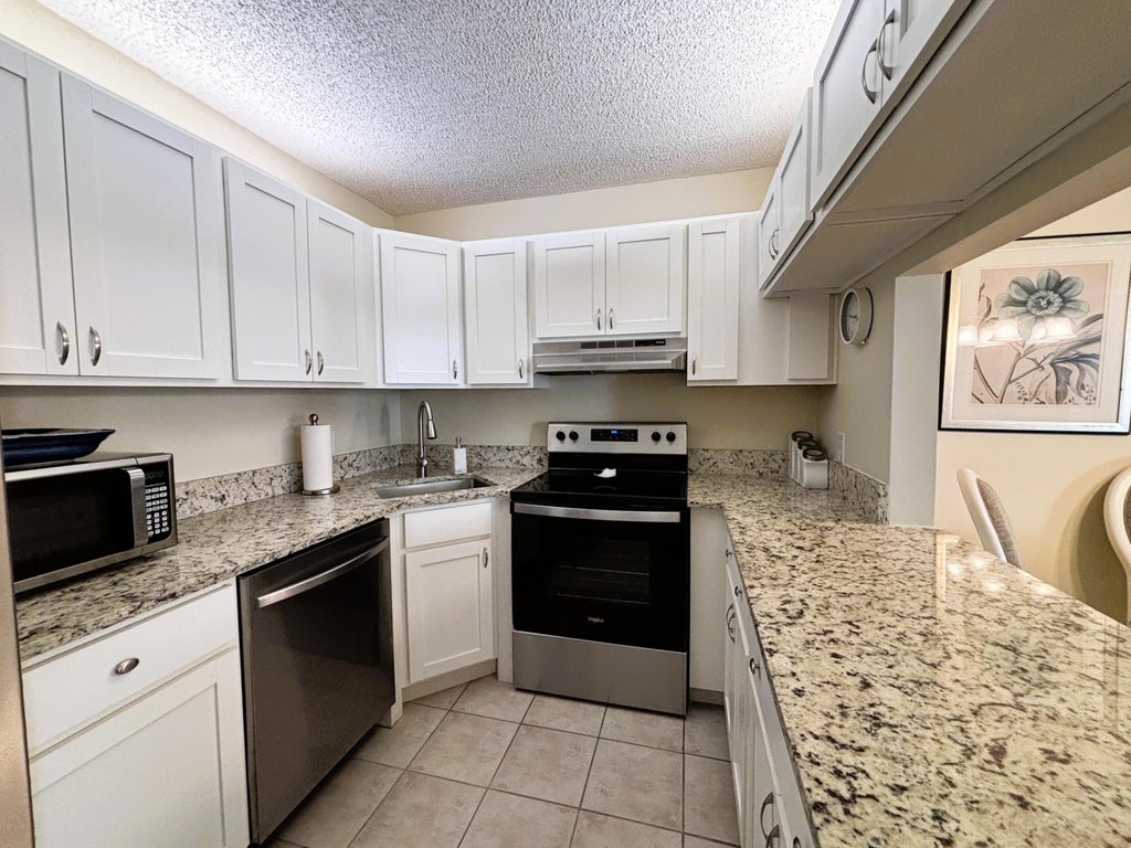 Photo of 2703 SW Matheson Avenue #116-C1, Palm City, FL 34990 (MLS # R11066900)