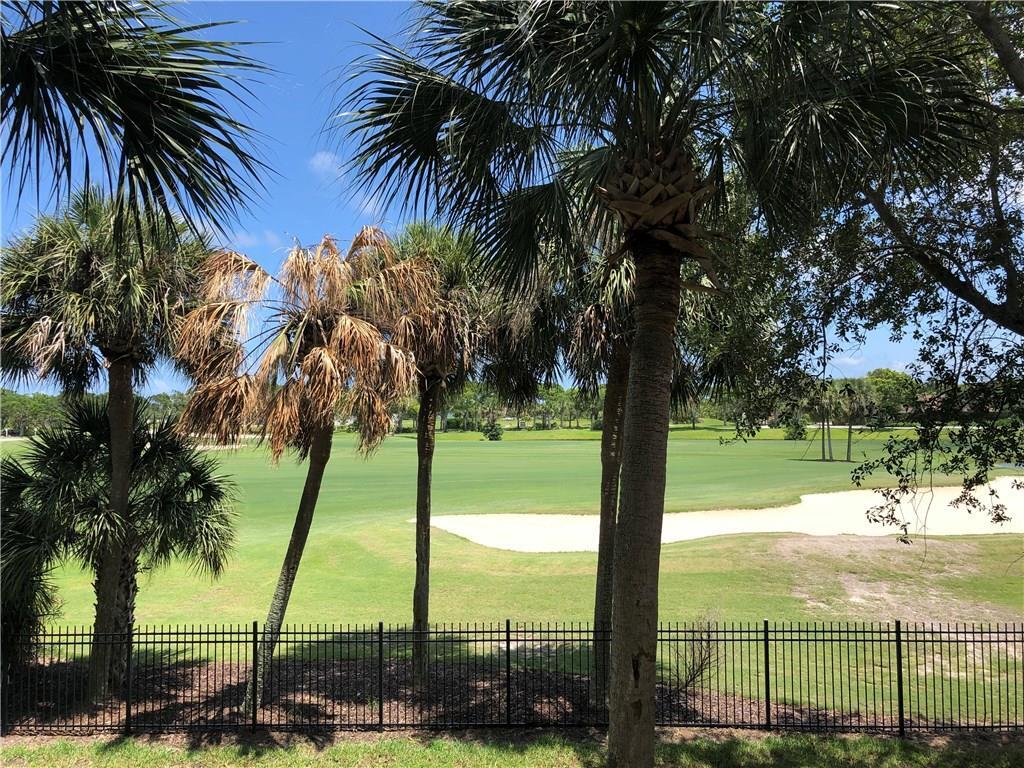 Beautiful golf course view on second floor. Elevator access, lots of amenities, newer plank tile floors throughout, stainless steel appliances in gated community of Fairways at Grand Harbor. Available now!
