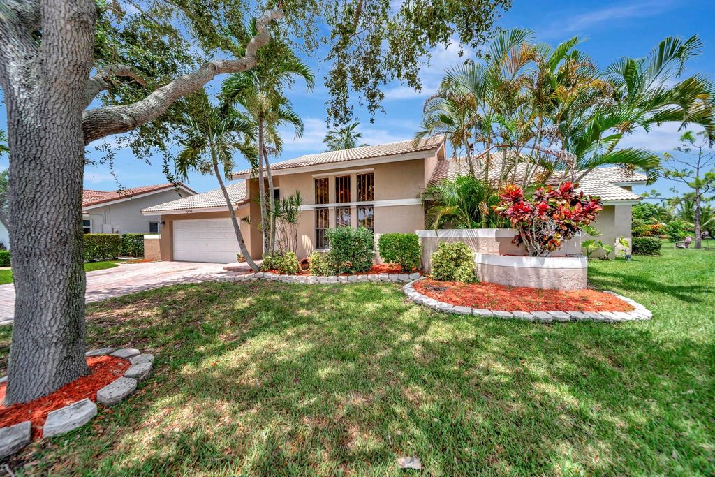 Photo of 5642 NW 64 Lane, Coral Springs, FL 33067 (MLS # F10535879)