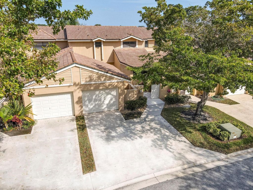 Photo of 493 Prestwick Circle, Palm Beach Gardens, FL 33418 (MLS # R11003929)