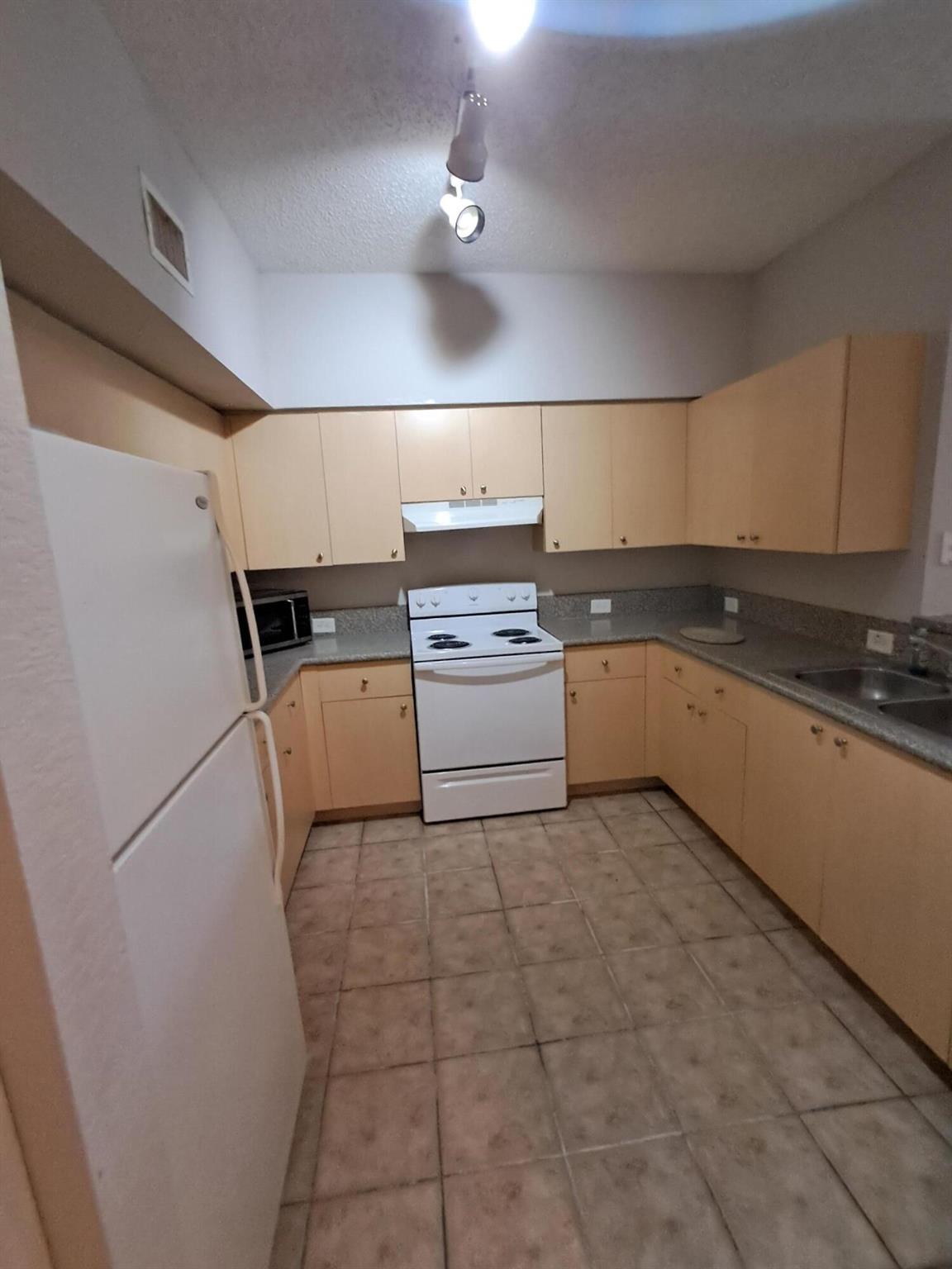 KENSINGTON OF ROYAL PALM - Residential Lease