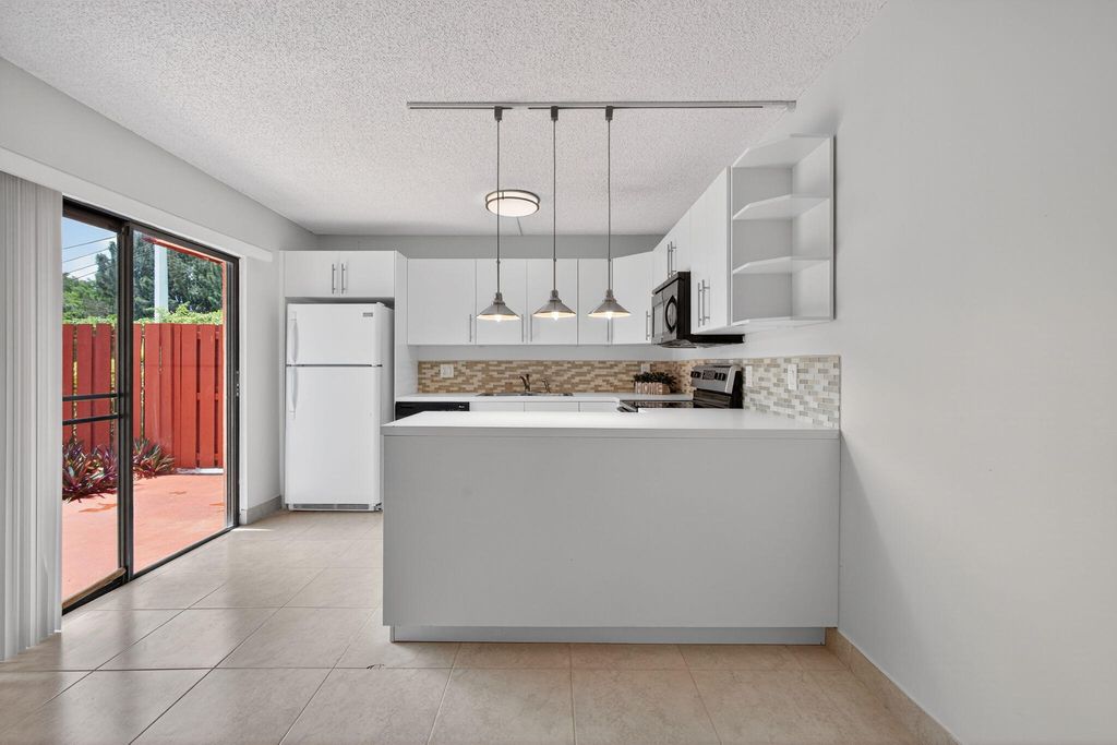 Photo of 3312 Spanish Wells Drive #47-A, Delray Beach, FL 33445 (MLS # R11104794)