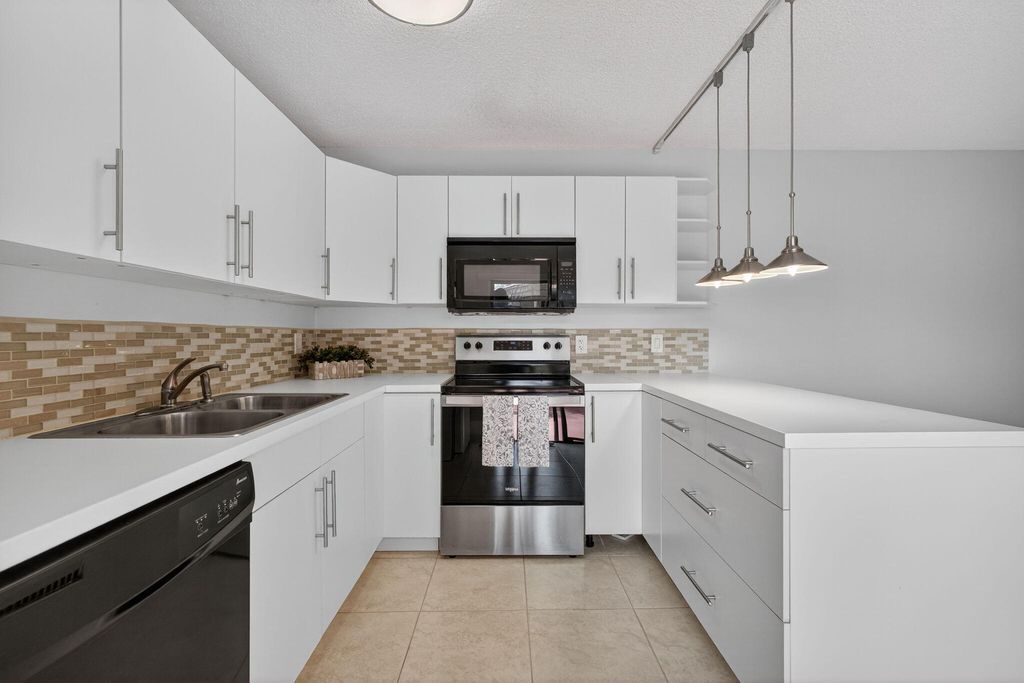 Photo of 3312 Spanish Wells Drive #47-A, Delray Beach, FL 33445 (MLS # R11104794)