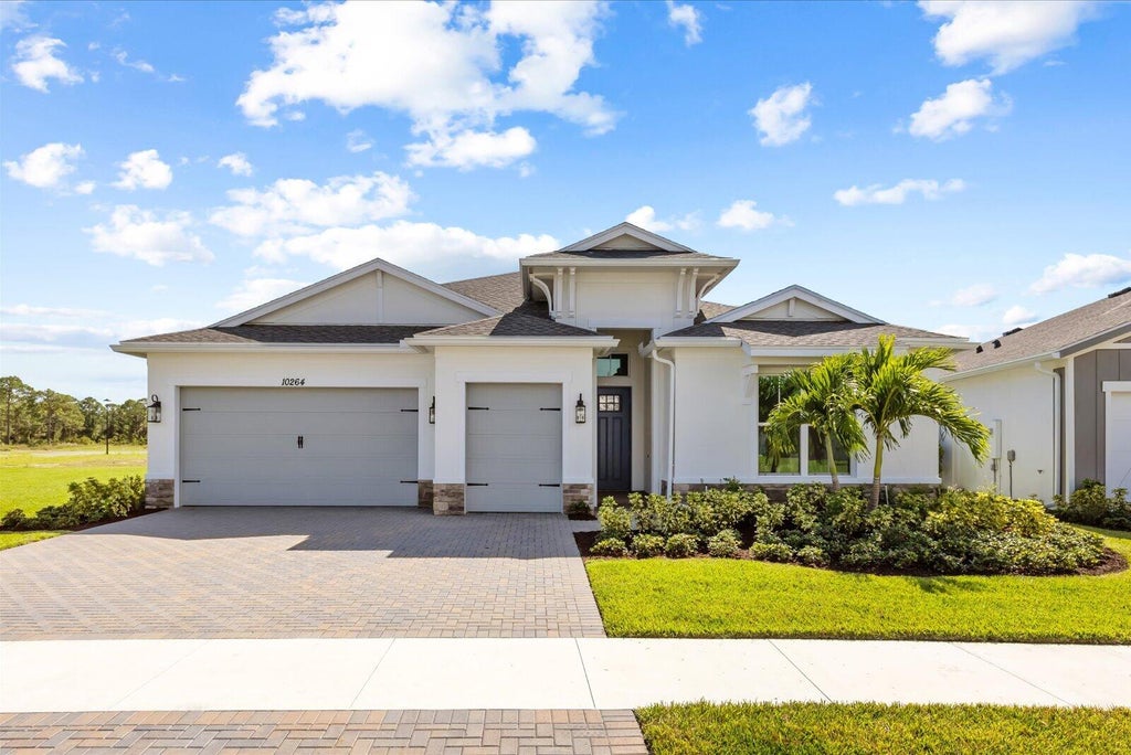 Photo of 10264 NW Field Flower Trail, Port Saint Lucie, FL 34987 (MLS # B26077958)
