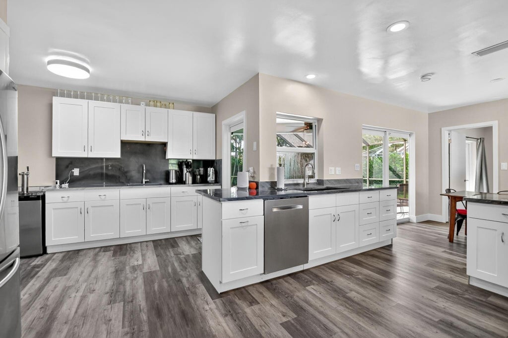 Photo of 1650 NW 9th Street, Boca Raton, FL 33486 (MLS # B26035997)