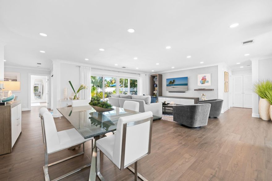 Discover your perfect retreat in Lighthouse Point, FL! This beautifully remodeled 3-bedroom, 3-bathroom home boasts an open, airy layout with new laminate floors and modern finishes. The updated kitchen features beautiful countertops and stainless appliances, ideal for entertaining. Relax in the spacious primary suite with a sleek ensuite, or unwind by the private backyard pool. Nestled in a vibrant waterfront community, you’re minutes from beaches, dining, and shops. With new systems and energy-efficient upgrades, this move-in-ready gem offers style and comfort.