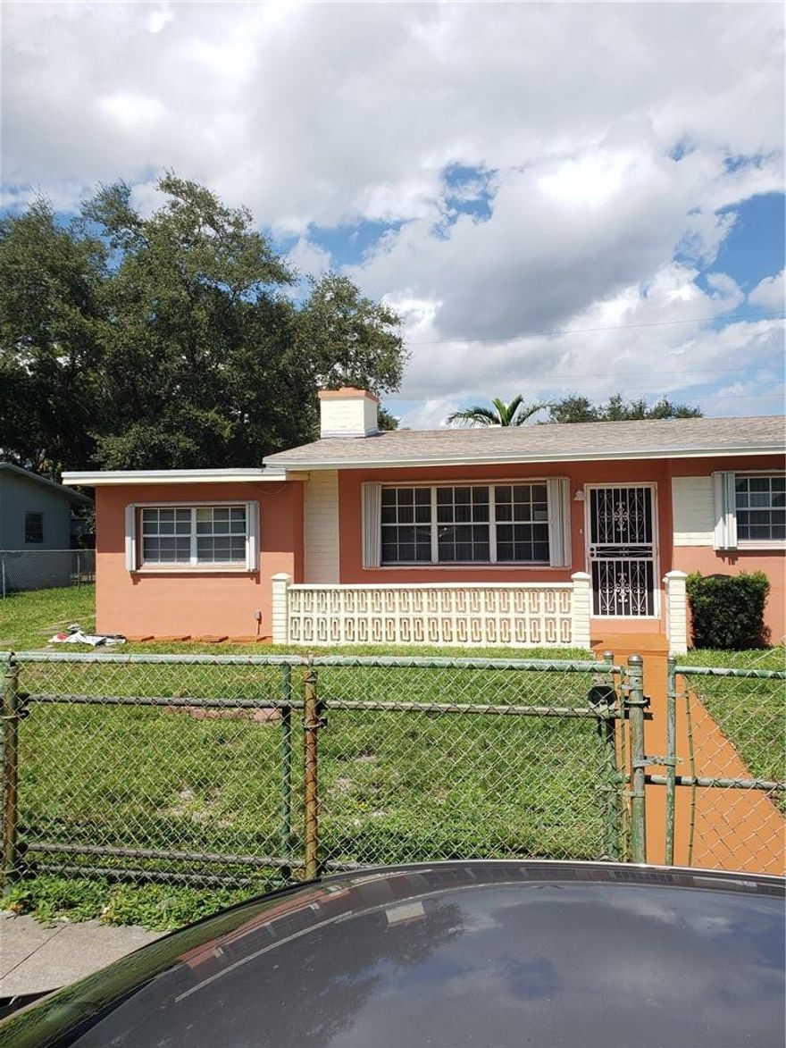 Great Corner Property located in nice NE. Miami-Dade County family neighborhood, best price in area. Home is very well kept, updated interior, eat in kitchen, pantry, fireplace, tiled floor throughout and Hurricane shutters on all windows. ***NEW SHINGLE ROOF ***, Home is close to shopping and transportation. Easy access to California Club Mall Aventura area, Miami Dolphins Hard Rock Stadium and more.