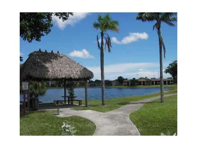 Photo of 207 LAKE POINTE Drive #102, Oakland Park, FL 33309 (MLS # B26092235)