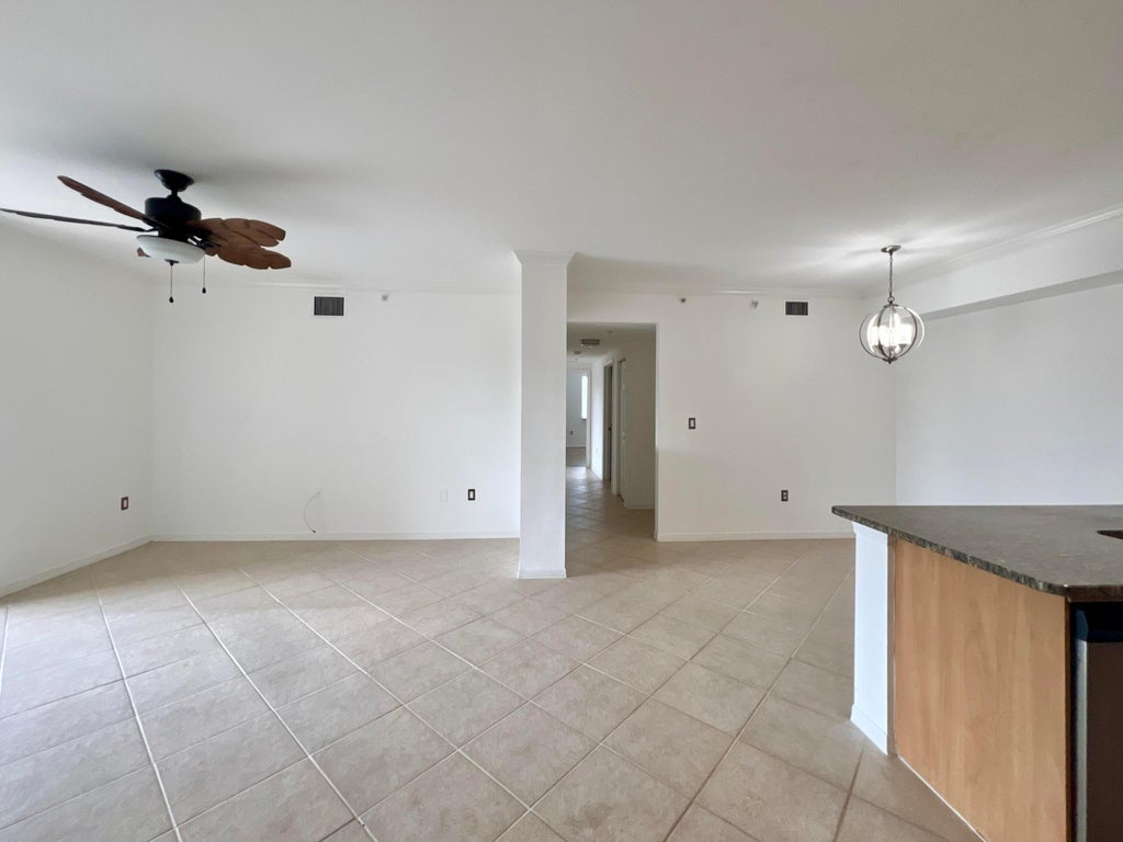 Photo of 6400 EMERALD DUNES Drive #104, West Palm Beach, FL 33411 (MLS # B26077068)