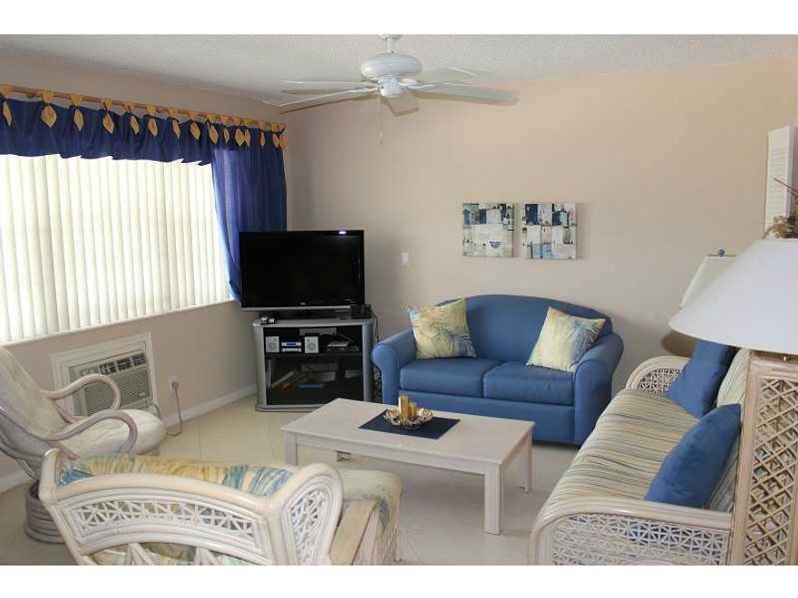 IMMACULATE, I BEDROOM/1 BATH, 2ND FLOOR, BUILDING HAS I LIFT! LARGE CERAMIC TILE ON DIAGNOL THRU-OUT, WHITE APPLIANCES, DISHES AND BUILT IN MICROWAVE! 2 A/C UNITS, CUSTOM DRAPERIES, BEAUTIFULLY DECORATED! FABULOUS LOCATION, WALK TO POOL, QUIET AND PEACEFUL AREA! PERECT WINTER GETAWAY! ASSOCIATION CLAIMS 55+