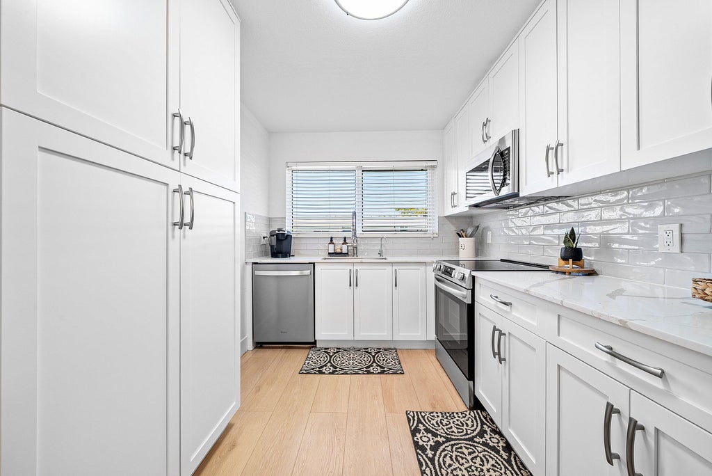 Photo of 621 E Woolbright Road #B407, Boynton Beach, FL 33435 (MLS # B26063887)
