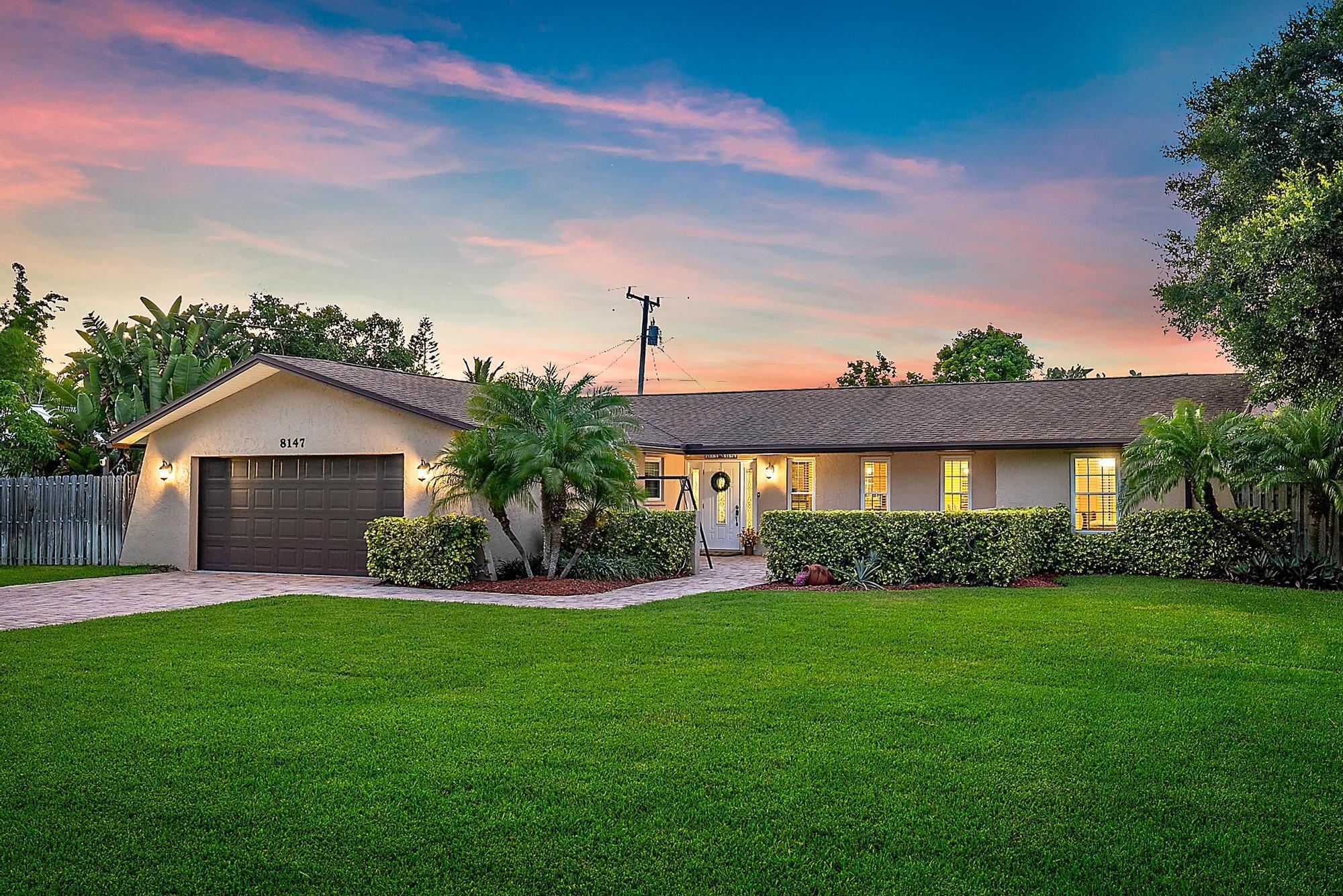 WELCOME to your slice of coastal paradise in the highly desirable, non-HOA community of North Hobe Sound Shores! This beautifully cared-for 3-bedroom, 2-bathroom single-family home offers over 1,700 square feet of comfortable living space, nestled on an oversized lot of more than one-third of an acre. With a spacious split floorplan, a 2-car garage, 2016 roof, 2021 A/C, and a huge backyard with room for a pool, this home has everything you've been dreaming of and more. Best of all, there are absolutely no rental, boat, or RV restrictions, making it the ultimate freedom-lovers retreat just minutes from the beach, grocery stores, shops, and US-1!Step inside and be greeted by a warm and welcoming layout that immediately feels like home. To your right, a bright formal living room invites
