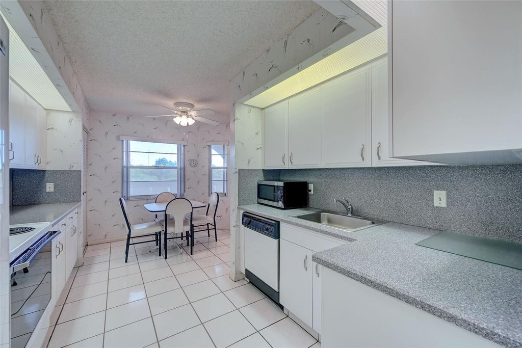 Photo of 1605 Abaco Dr #D4, Coconut Creek, FL 33066 (MLS # F10392404)