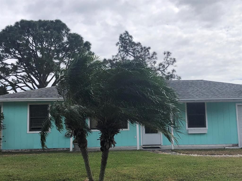 Photo of 374 SE Evans Avenue, Port Saint Lucie, FL 34984 (MLS # R10703277)