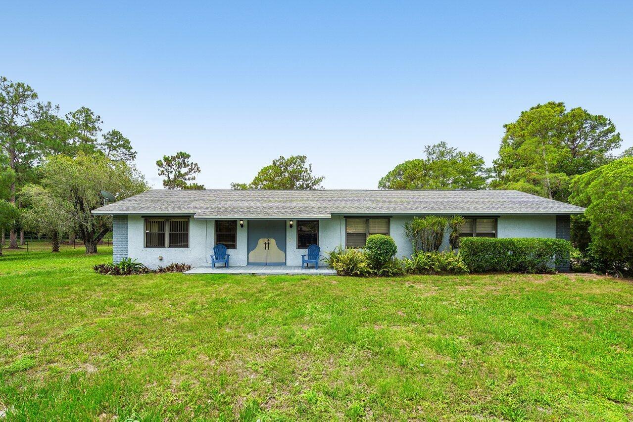 Welcome to your ideal retreat! This well-maintained CBS ranch-style home offers spacious living on a fully fenced 1.29-acre lot. Featuring 3 bedrooms plus a versatile bonus room with a private entrance--perfect for use as a 4th bedroom, home office, or den--this property provides flexibility to suit your lifestyle. Enjoy ample storage and workspace with a massive 1,040 sq. ft. (40' x 26') detached garage, complete with workbenches, as well as a separate 30' x 21' pole barn with electric on a concrete slab. Additional features include a 20' x 17' screened-in patio with tiled flooring and a storage shed for added convenience. The roof and A/C were both replaced in 2019, ensuring peace of mind. Inside, you'll find a formal dining room, a spacious indoor laundry room with built-in