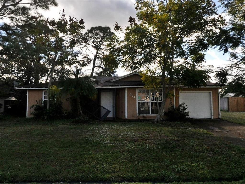 Photo of 374 NE Gulfstream Avenue, Port Saint Lucie, FL 34983 (MLS # R10732063)