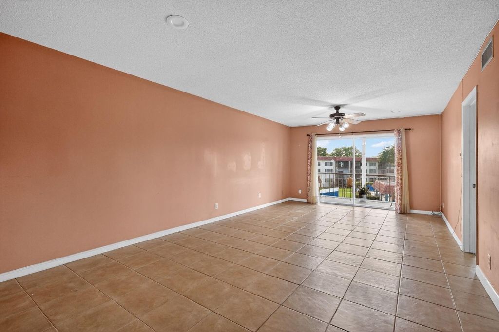 Photo of 9410 N Hollybrook Lake Drive #303, Pembroke Pines, FL 33025 (MLS # F10543523)