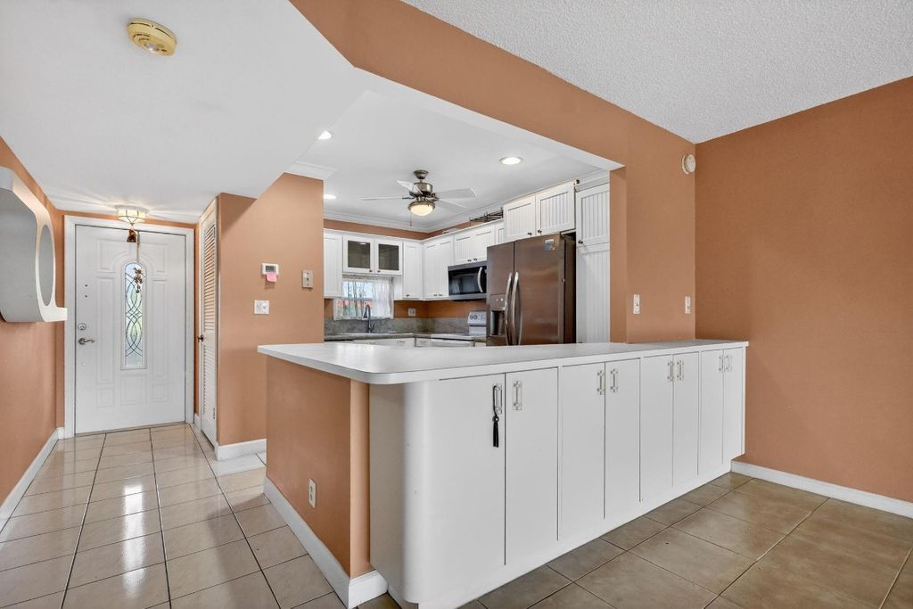 Photo of 9410 N Hollybrook Lake Drive #303, Pembroke Pines, FL 33025 (MLS # F10543523)