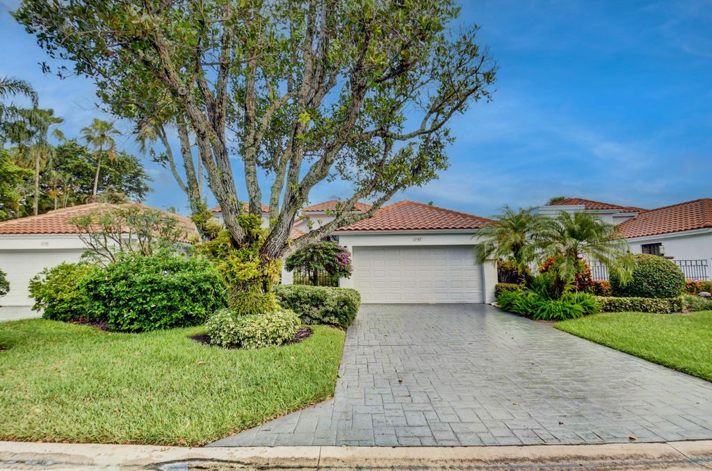 Photo of 2187 NW 59th Street, Boca Raton, FL 33496 (MLS # B26020934)