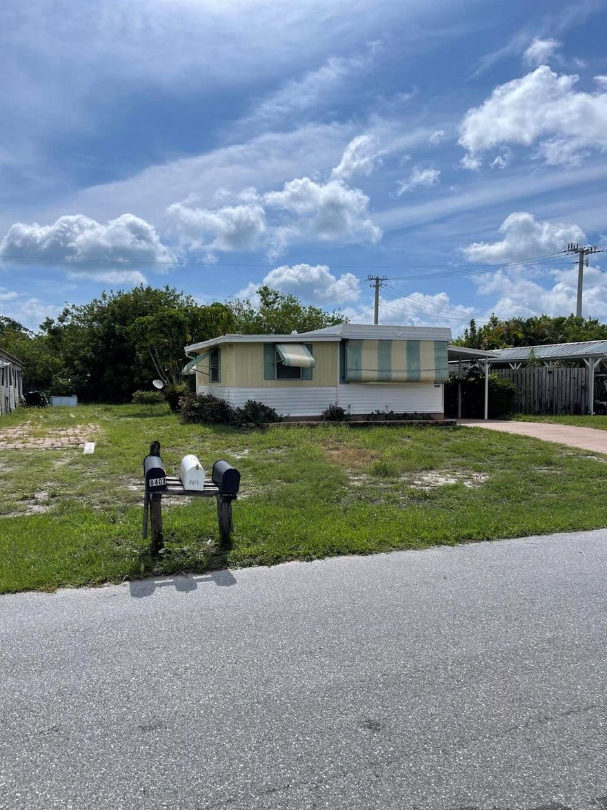I Have A Mortgage Lender For This Great Location And You Own The Land! Close To Hobe Sound Beach, Restaurants, Shopping, Entertainment And Walking Distance to Publix Grocery Store.
Expanded Single Wide With Extra Space, Large Utility/Storage Room, Screened Covered Front Patio With Covered Carport, Storage Shed in Backyard, Large Eat-In Kitchen, Central A/C, Water Filter And Softner. Voluntary fee for pool/clubhouse $300/Year.