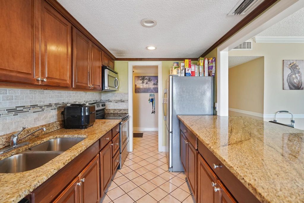 Photo of 4174 Inverrary Drive #701, Lauderhill, FL 33319 (MLS # B26018512)