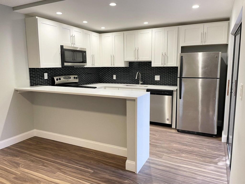 Photo of 1011 10th Court, Palm Beach Gardens, FL 33410 (MLS # R10956563)