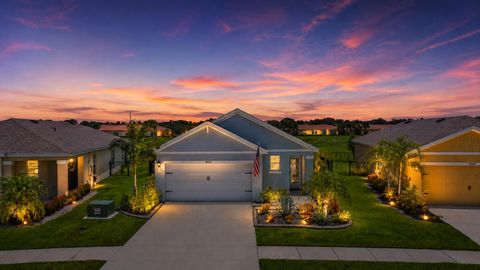 Photo of 10555 SW VASARI Way, Port Saint Lucie, FL 34987 (MLS # B26054535)