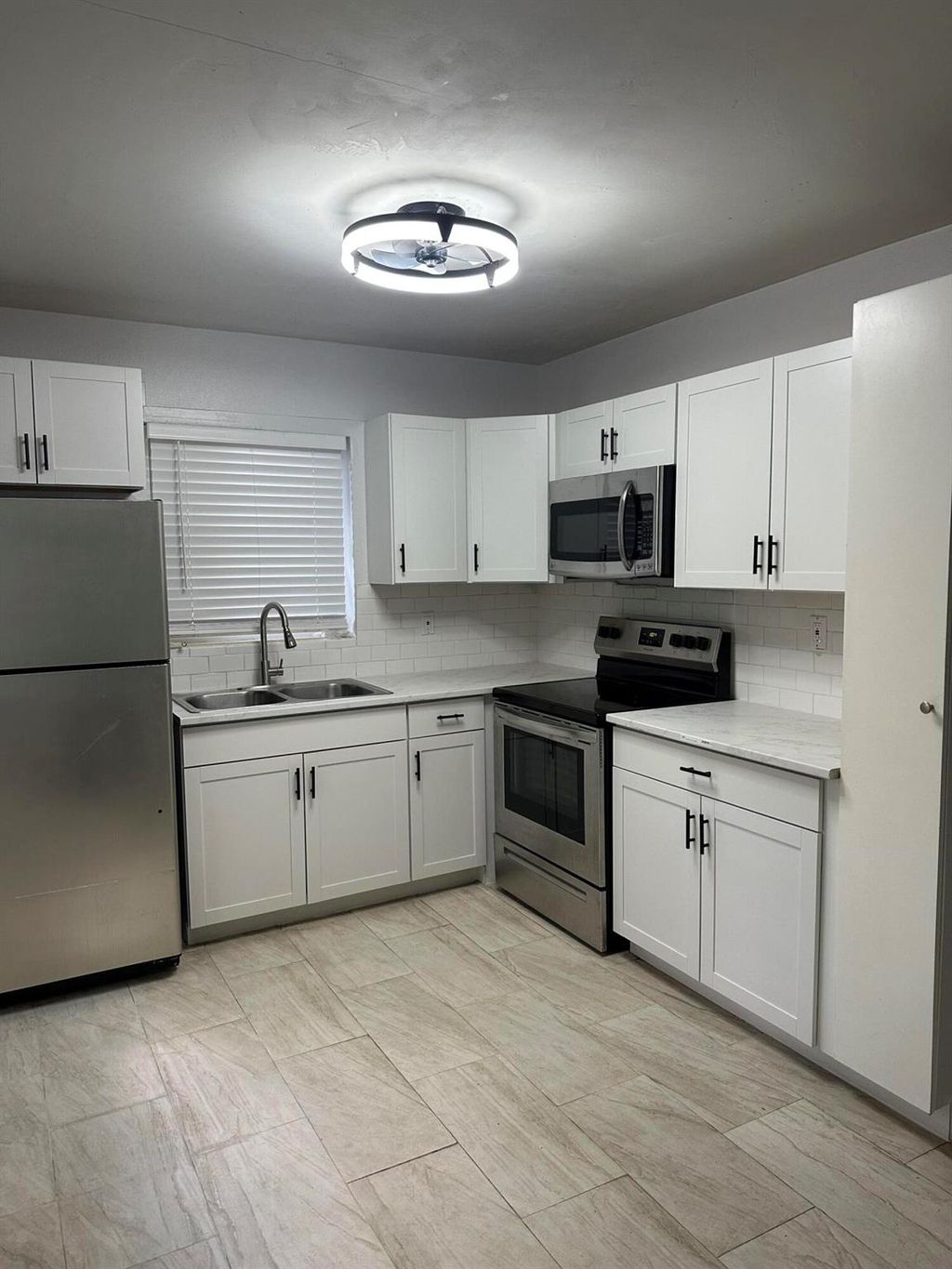 Photo of 178 E 27th Street #3, Riviera Beach, FL 33404 (MLS # R11125435)
