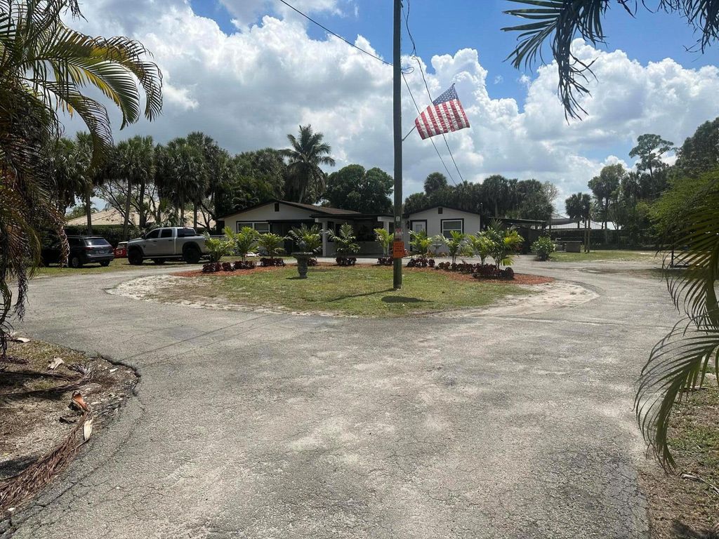 Photo of 214 Westwood Circle E, West Palm Beach, FL 33411 (MLS # R11050276)