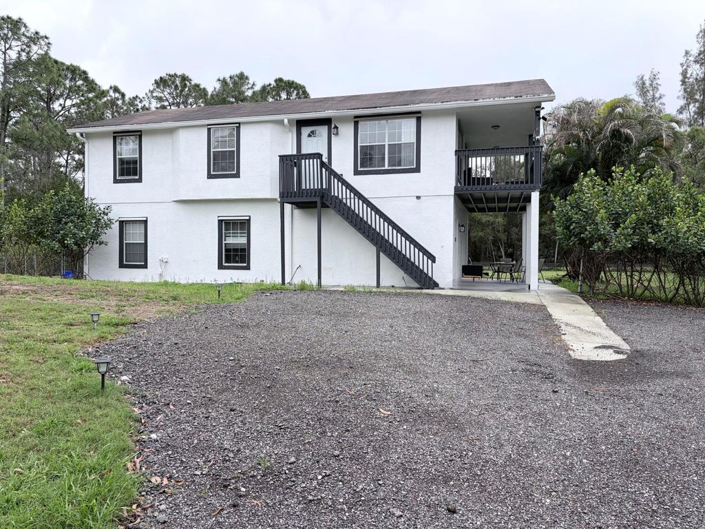 Photo of 11128 N 59th St Street N, The Acreage, FL 33411 (MLS # B26012426)