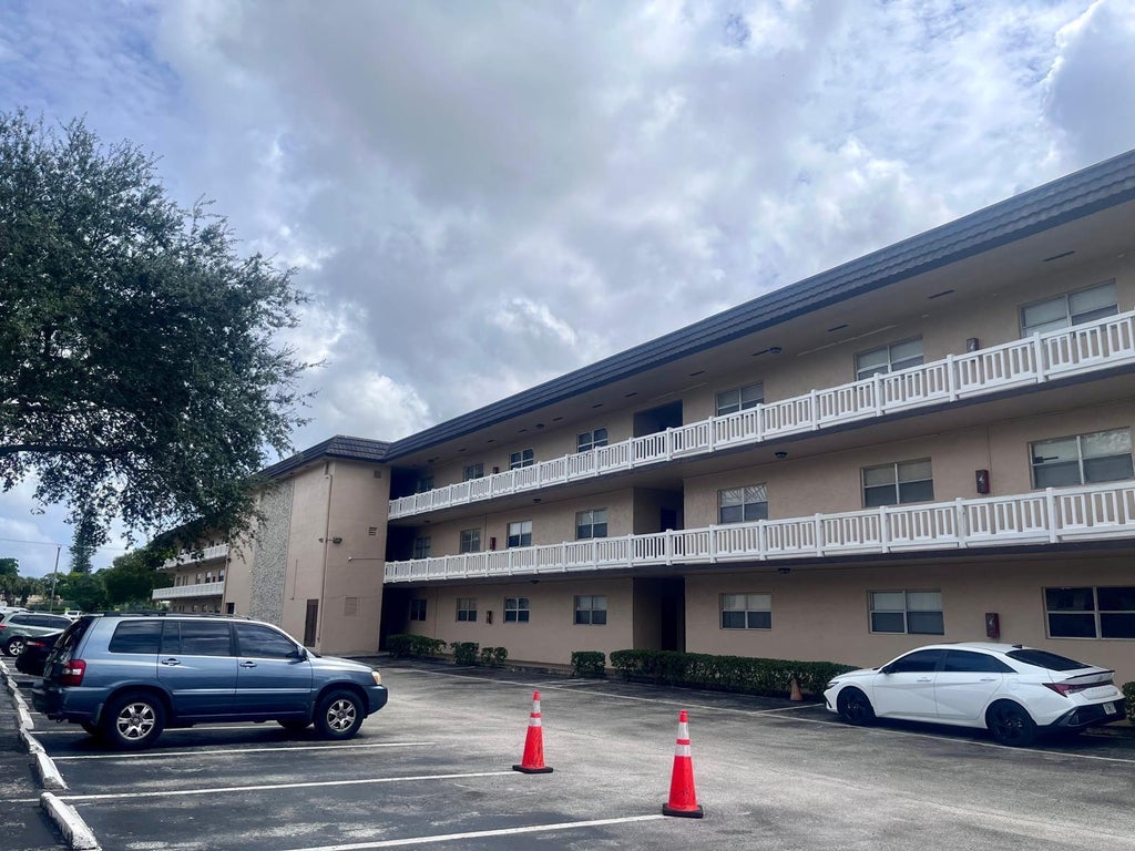 Photo of 5861 NW 16TH Place #313, Sunrise, FL 33313 (MLS # B26083975)