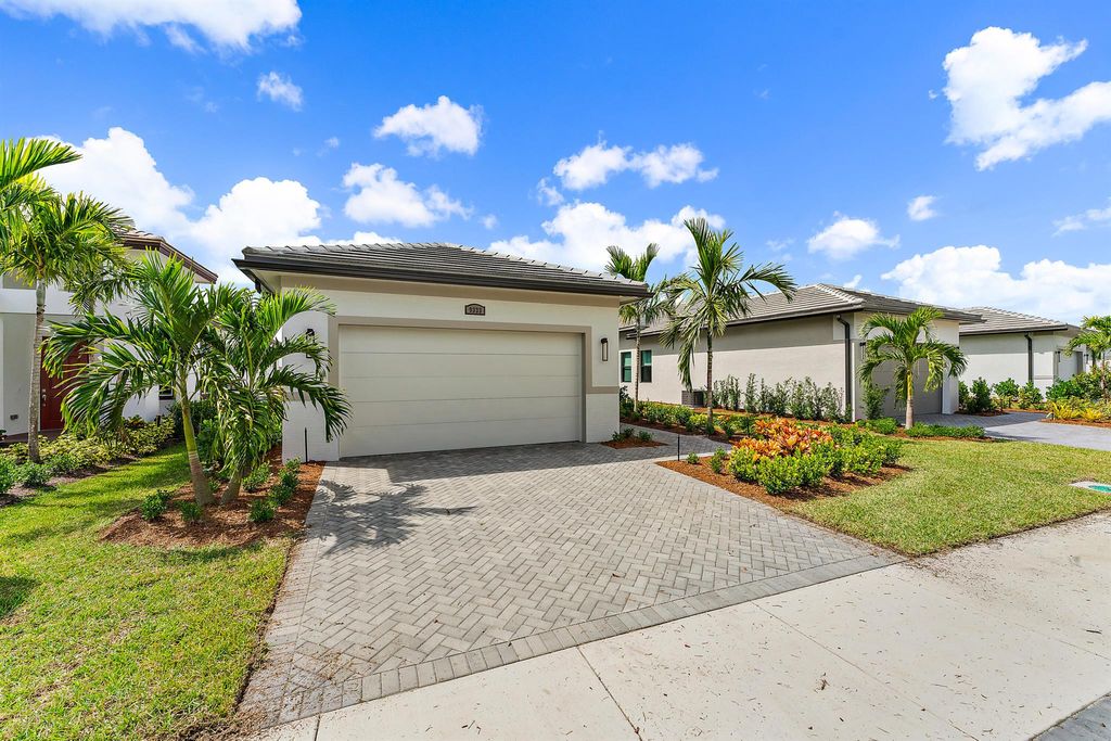 Photo of 9333 SW Pepoli Way, Port St Lucie, FL 34987 (MLS # R11022023)