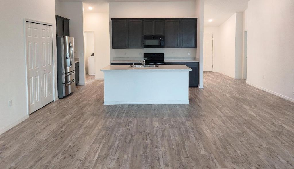 Photo of 1614 SW Sylvester Lane, Port Saint Lucie, FL 34984 (MLS # R11091628)