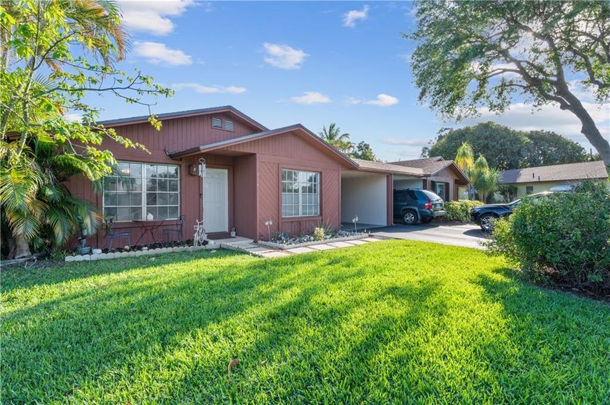 This Lovely Villa Features Two Bedrooms and Two Bathrooms with the Most Desirable Floorplan in Los Mangos! This Quaint Community is Located Just a Half Mile from the Ocean and Minutes from Downtown Delray! The Kitchen Features White Appliances and an Island with a Wood Counter Top and Seating Area. Open Dining/Den Area off Kitchen. Tile Flooring Flooring. Renovated Bathrooms 2020. AC 2014. Spacious Primary Bedroom with Sliding Doors to Patio. Laundry Room is Adjacent to the Kitchen Entrance by the Carport. Enjoy Your Patio and Outdoor Living Space with Lush Greenery. Washer and Dryer Do Not Convey.