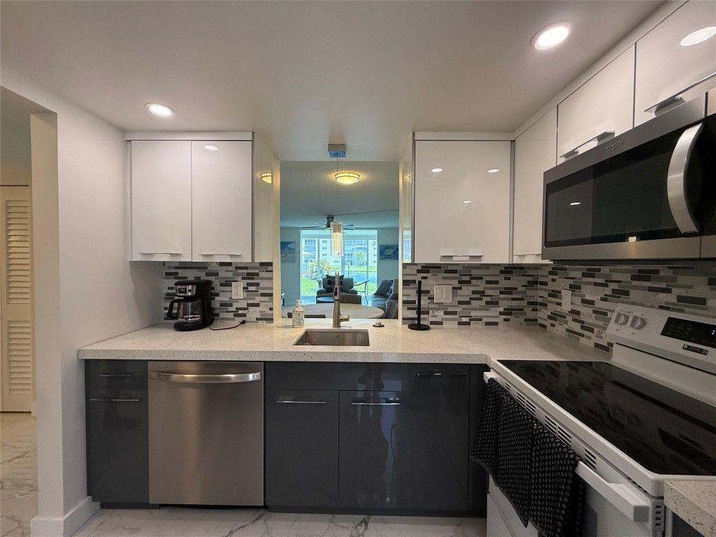 Photo of 1025 SE 2nd Avenue #105, Dania Beach, FL 33004 (MLS # F10514563)