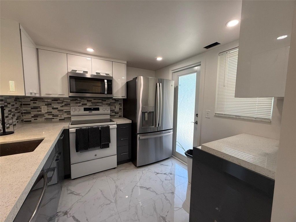 Photo of 1025 SE 2nd Avenue #105, Dania Beach, FL 33004 (MLS # F10514563)