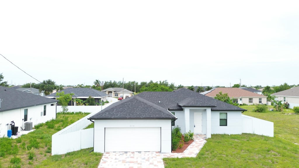 Photo of 2458 NW 9th Ter, Cape Coral, FL 33993 (MLS # R11136230)