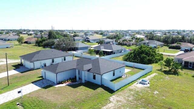 Photo of 2458 NW 9th Ter, Cape Coral, FL 33993 (MLS # R11136230)
