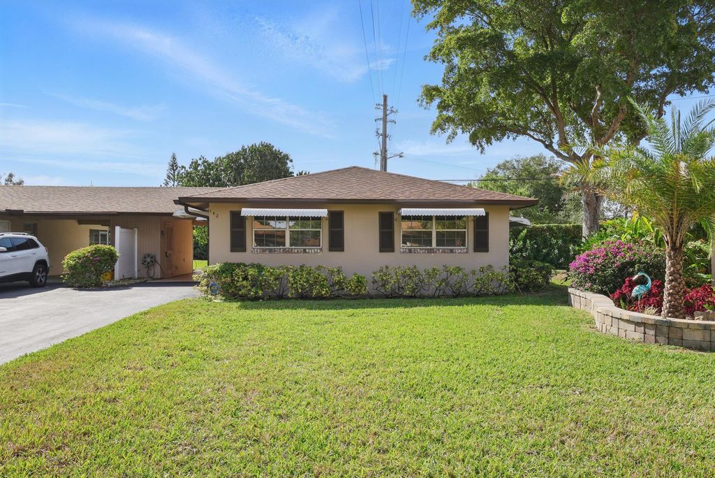 Photo of 142 Mockingbird Lane, Delray Beach, FL 33445 (MLS # R11079961)