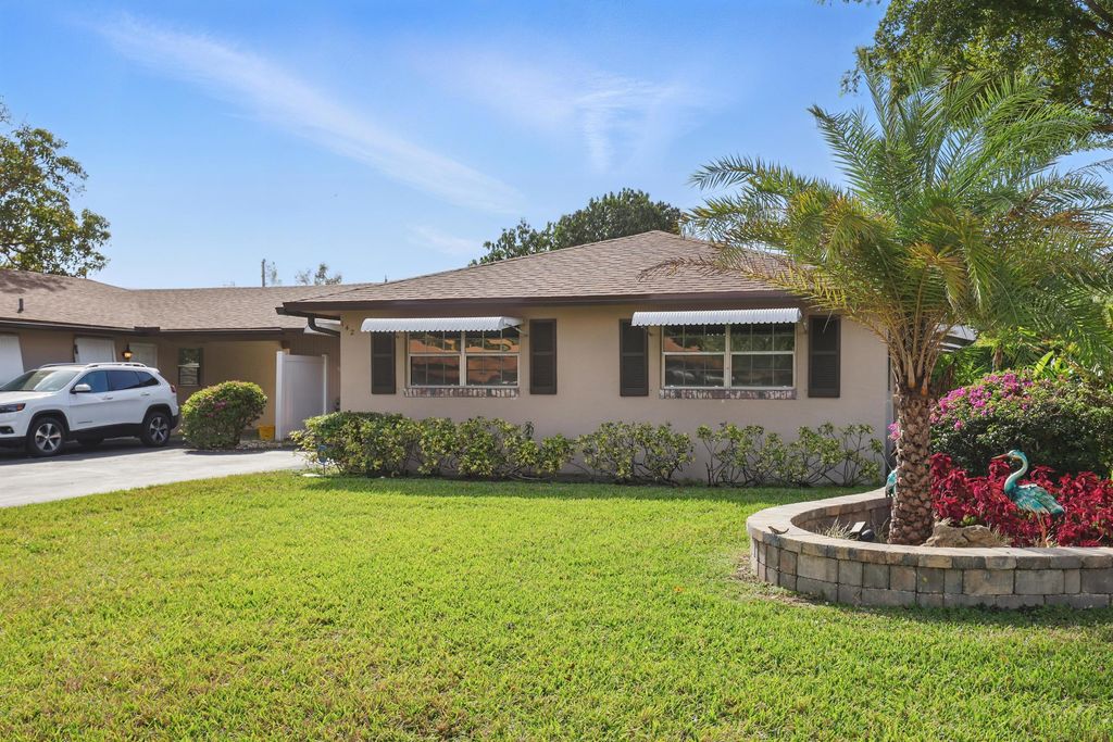 Photo of 142 Mockingbird Lane, Delray Beach, FL 33445 (MLS # R11079961)