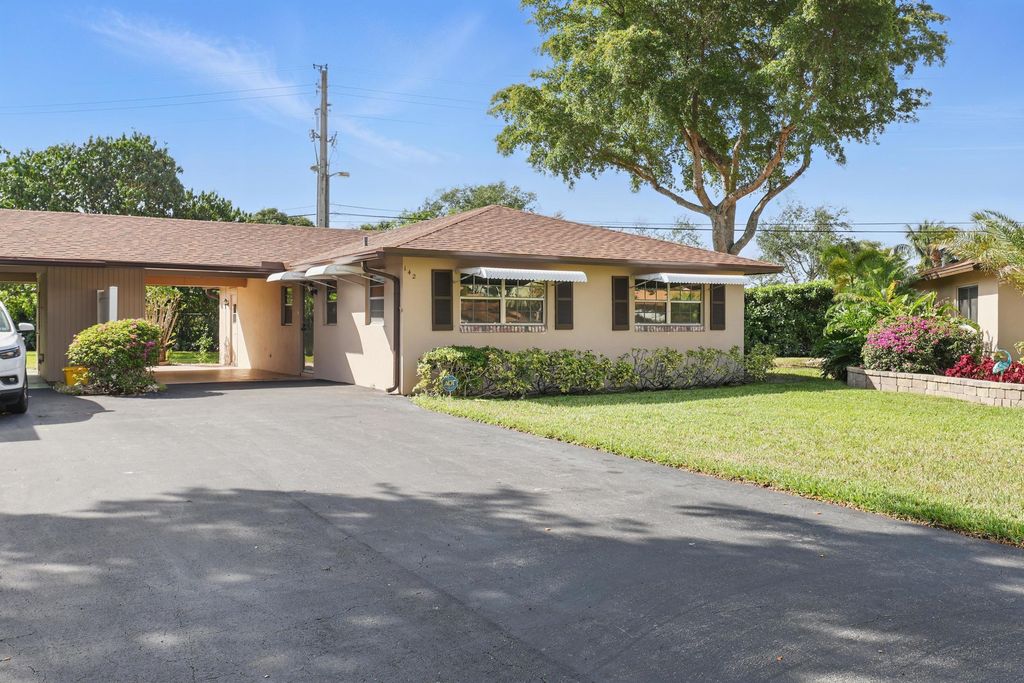 Photo of 142 Mockingbird Lane, Delray Beach, FL 33445 (MLS # R11079961)