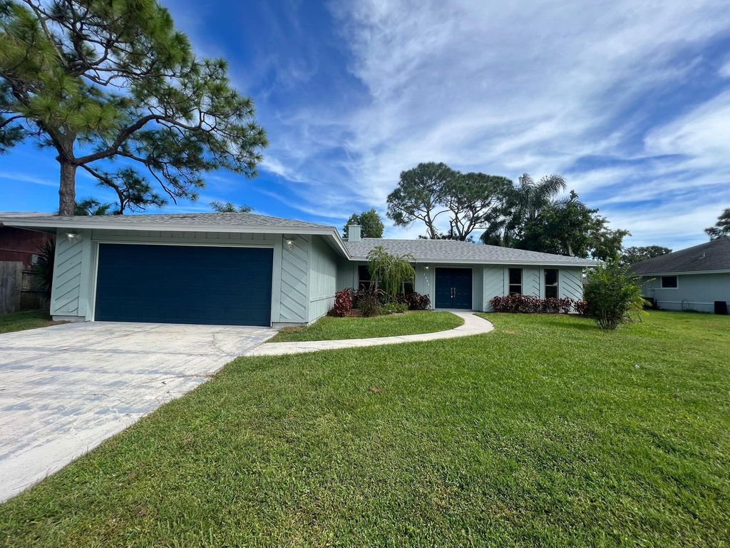 Photo of 1325 SE Floresta Drive, Port St Lucie, FL 34983 (MLS # R10928740)