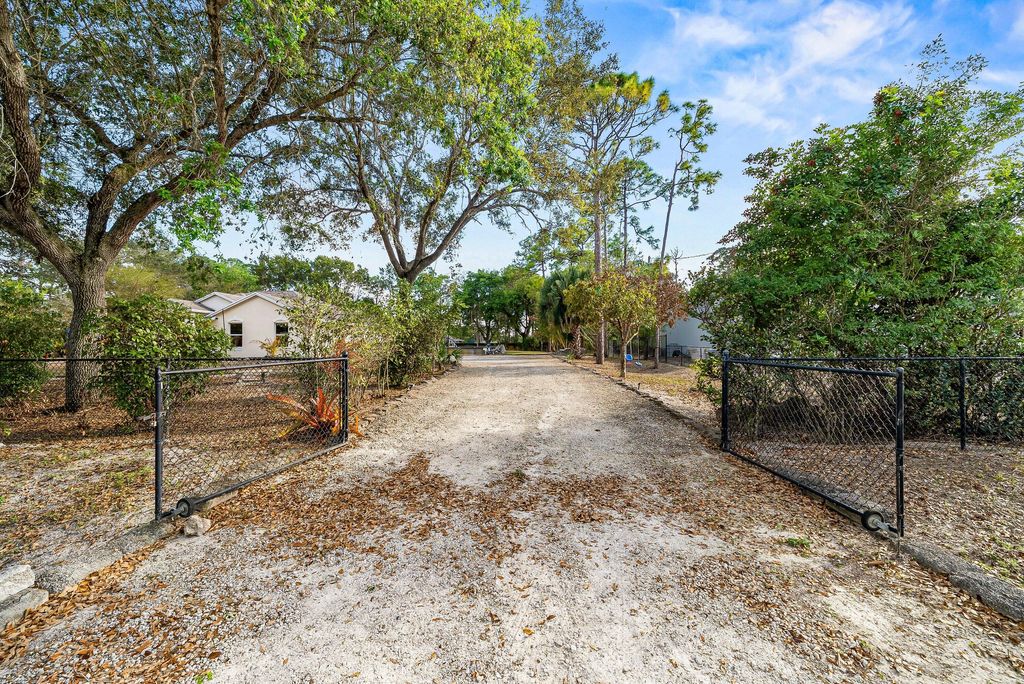 Photo of 18098 93rd Road N, The Acreage, FL 33470 (MLS # R11169164)