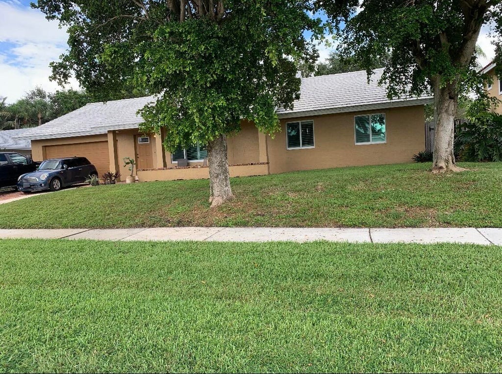 Photo of 4885 Sugar Pine Drive, Boca Raton, FL 33487 (MLS # B26092287)
