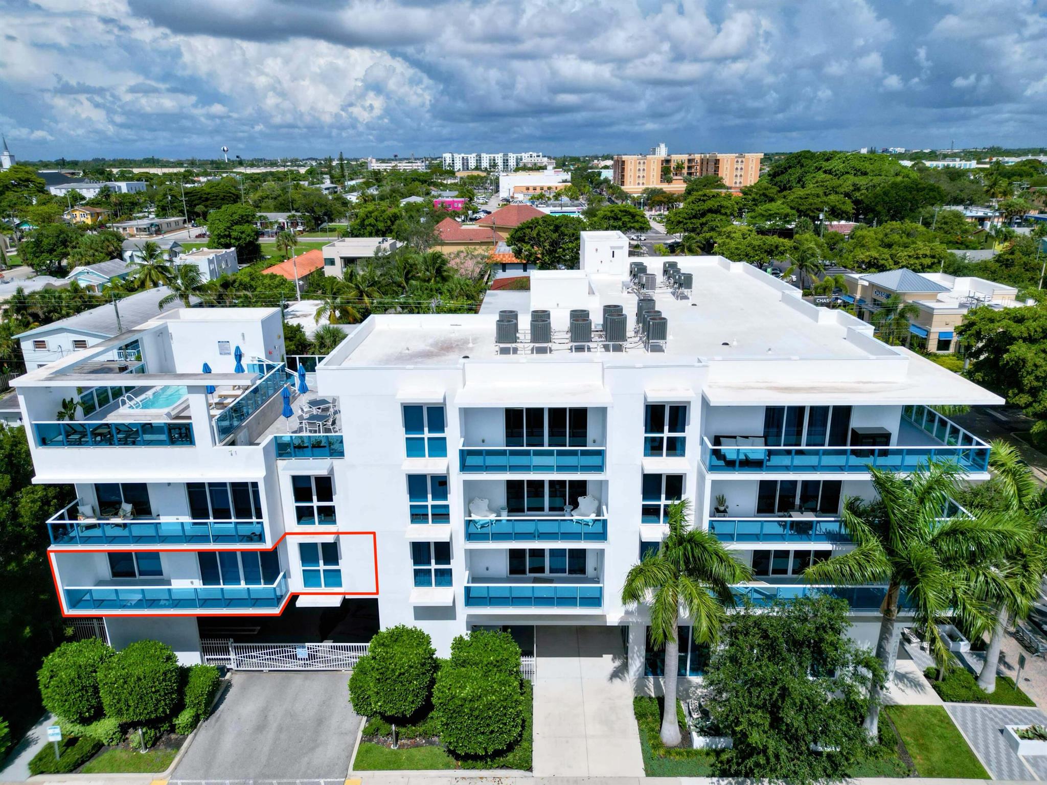 Barely lived in and like new construction, this luxury condo is located in a boutique building with secured lobby, rooftop pool/spa with loungers, intracoastal views, outdoor kitchen and BBQ area. The open split-bedroom layout offers two spacious en-suites, a foyer entry, high ceilings, impact windows, and an expansive east-facing balcony for morning sun. The gourmet kitchen features top-tier cabinetry, wall oven, built-in microwave, stainless steel appliances and breakfast bar. Enjoy covered parking with gated entry, a large storage closet, and close proximity to the beach, intracoastal parks, fine dining, art galleries, antique shops, Lake Worth Playhouse, and Lake Worth Beach Golf Club. A rare opportunity in a one-of-a-kind building and prime location off Lucerne Ave! Easy showings!