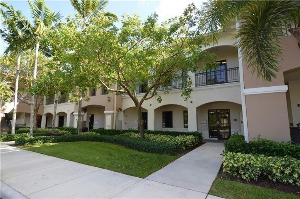 Photo of 7551 Wiles Road #103, Coral Springs, FL 33067 (MLS # B26025490)