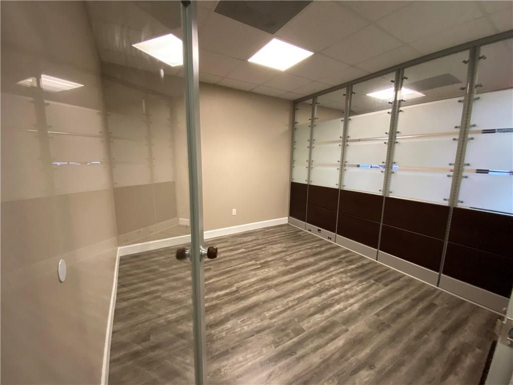 Photo of 7551 Wiles Road #103, Coral Springs, FL 33067 (MLS # B26025490)